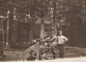 Boys on Harley twin with sidecar